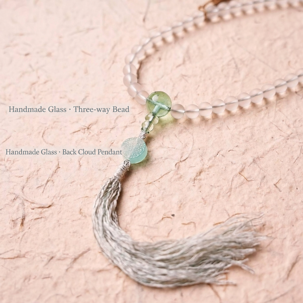 Handmade white glass bead necklace with 108 beads, suitable for meditation and spiritual practice. Women's bracelet featuring White Tara.