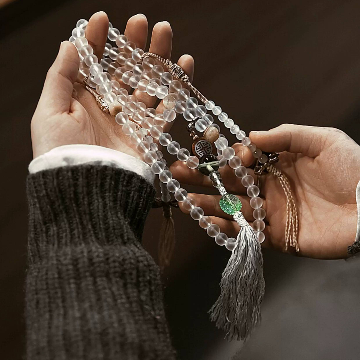 Handmade white glass bead necklace with 108 beads, suitable for meditation and spiritual practice. Women's bracelet featuring White Tara.
